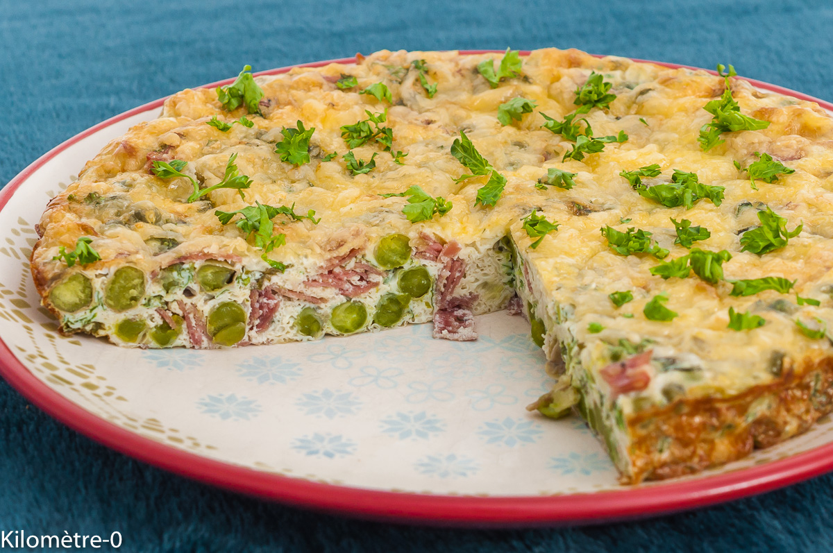 Photo de recette de  frittata, italienne, omelette, four, oeufs, petits pois, printemps, facile, bio, rapide, fromage, gâteau salé, Kilomètre-0, blog de cuisine réalisée à partir de produits de saison et issus de circuits courts